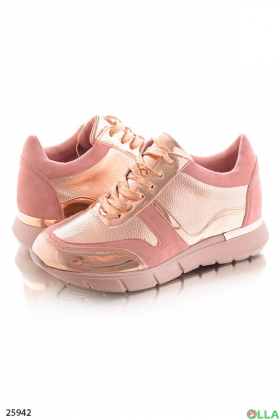 Pink sneakers with gold accents