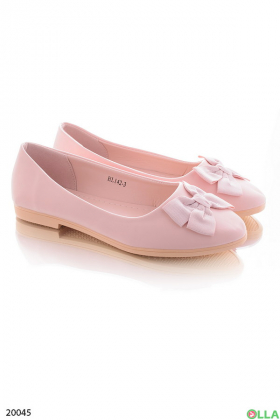 Pink ballerinas with a bow