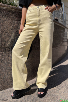 Women's yellow flared trousers