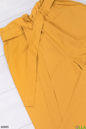 Женские желтые брюки