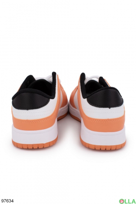 Жіночі оранжево-білі кросівки з еко-шкіри