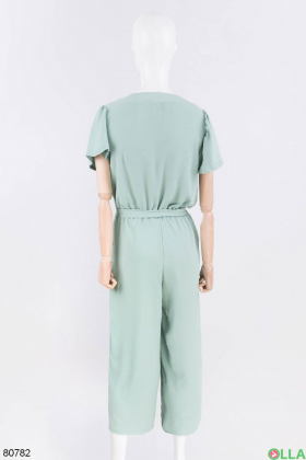 Women's turquoise jumpsuit with a belt