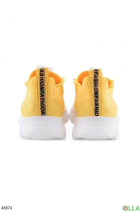 Жіночі жовті кросівки