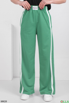 Жіночі зелені спортивні брюки