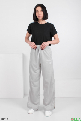 Жіночі світло-сірі спортивні брюки