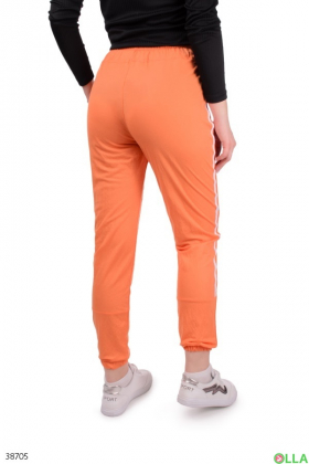 Жіночі помаранчеві штани