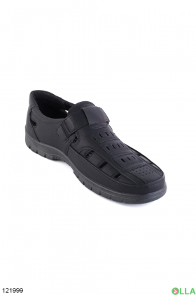 Men's black shoes with perforations