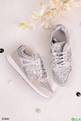 Стильні кросовки сріблястого кольору