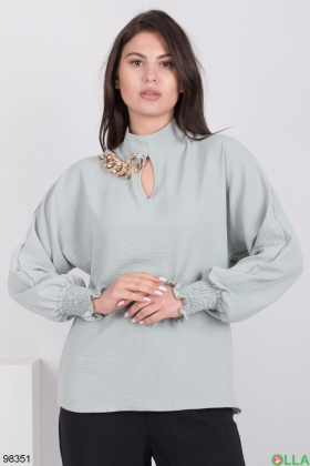 Женская бирюзовая блузка с декором