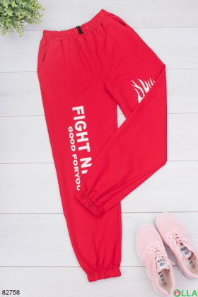 Жіночі червоні спортивні брюки з написами