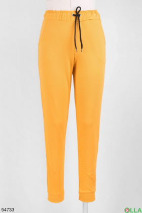 Women's orange sweatpants