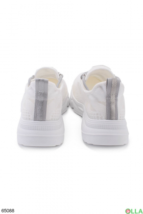 Women's white sneakers with gray lacing