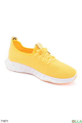 Жіночі жовті кросівки на шнурівці