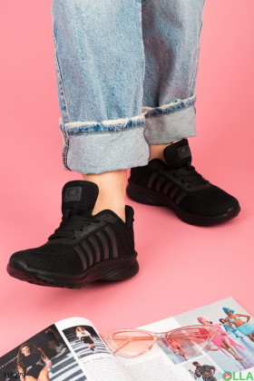 Women's black lace-up sneakers