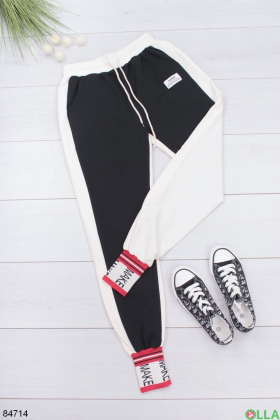 Жіночі чорно-білі спортивні штани