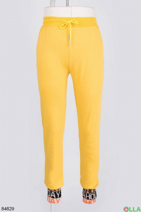Жіночі жовті спортивні штани