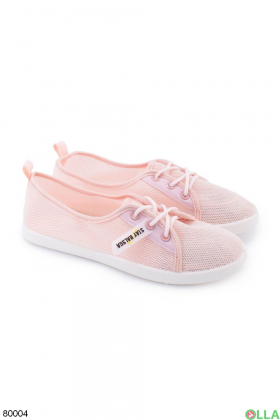 Women's pink lace-up sneakers