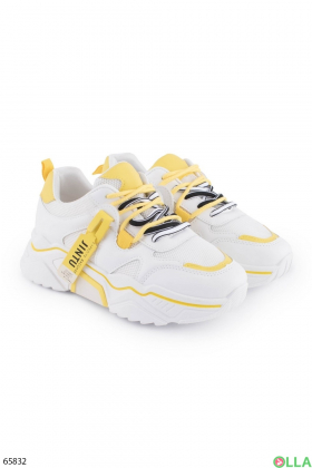 Жіночі білі з жовтими вставками кросівки на шнурівці