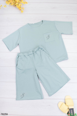 Women's turquoise T-shirt and shorts suit
