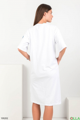 Women's white knitted dress with an inscription