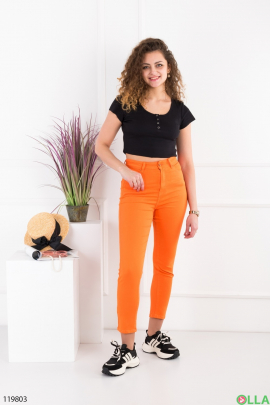 Женские оранжевые брюки-скинни
