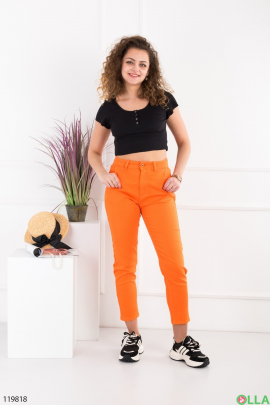 Женские оранжевые брюки-скинни