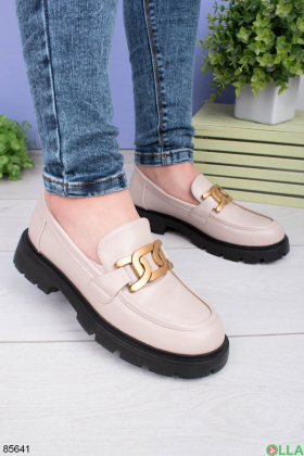Women's beige shoes with a buckle