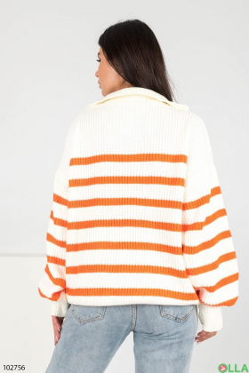 Жіночий біло-помаранчевий светр в смужку