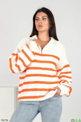 Жіночий біло-жовтогарячий светр в смужку