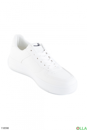 Жіночі білі кросівки на шнурівці