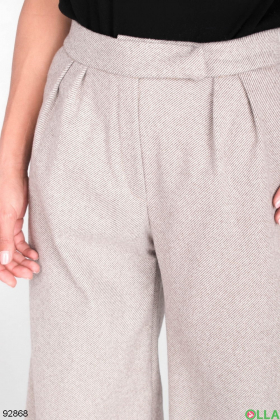 Жіночі бежеві брюки