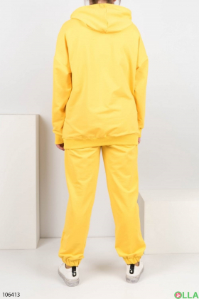 Жіночий жовтий спортивний костюм батал