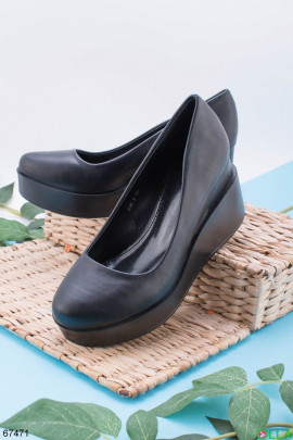 Women's black platform shoes made of eco-leather