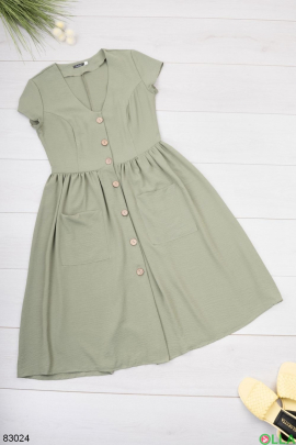 Women's dress with buttons in khaki