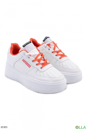 Жіночі біло-помаранчеві кросівки