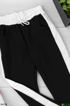 Жіночі спортивні штани чорного кольору на флісі