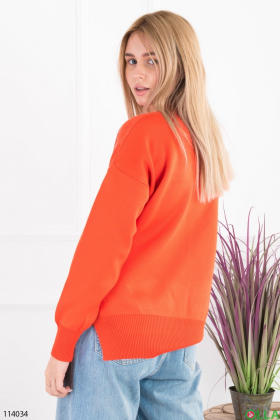 Женский оранжевый свитер с надписью