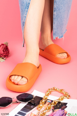 Women's orange flip-flops
