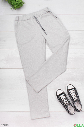 Жіночі світло-сірі спортивні брюки