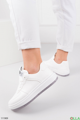 Women's white sneakers made of eco-leather