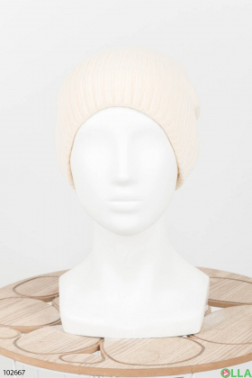 Жіноча зимова світло-бежева шапка