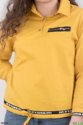 Женская желтая рубашка с надписями