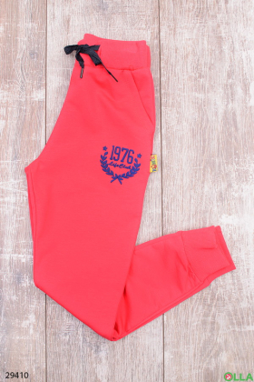 Коралловые спортивные штаны с надписью