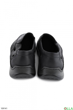 Men's black perforated shoes