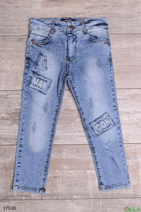 Выбеленные джинсы с  декоративными латками