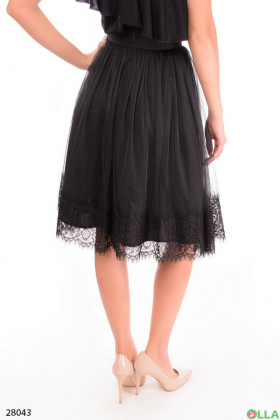 Женская черная юбка с ажурным низом
