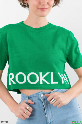 Women's green top with slogan