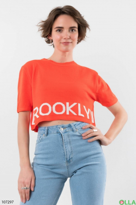 Women's orange top with slogan