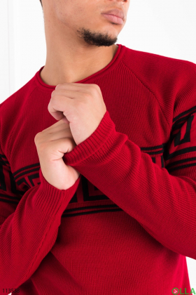 Men's red sweater with an ornament