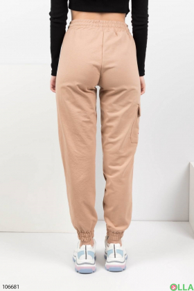 Women's beige sweatpants with white inserts